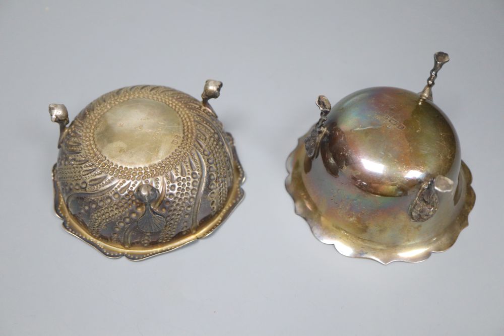 A pierced and embossed silver footed bowl, maker C.C, Chester 1907 and two silver sugar bowls, approx 13oz